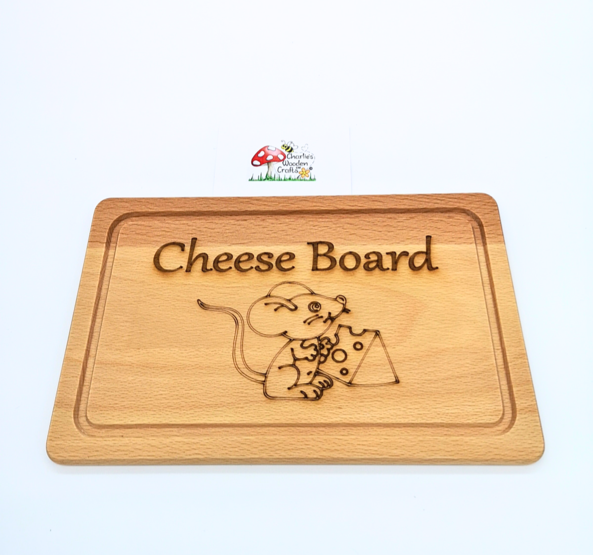 A Cheese Board made from a rectangle Beech hardwood board with a laser engraved design.