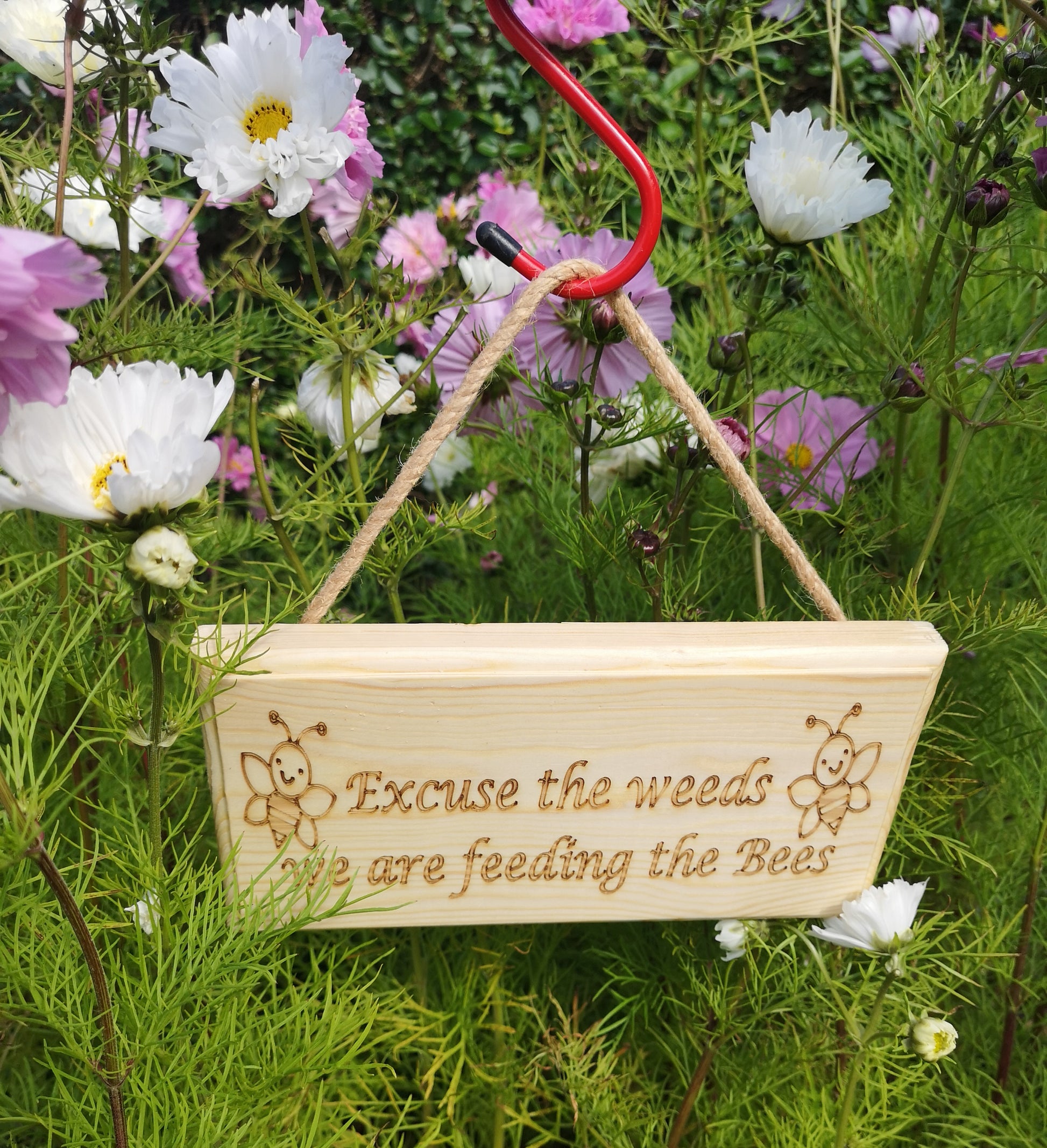 Excuse the weeds we are feeding the bees outdoor garden sign - Hanger