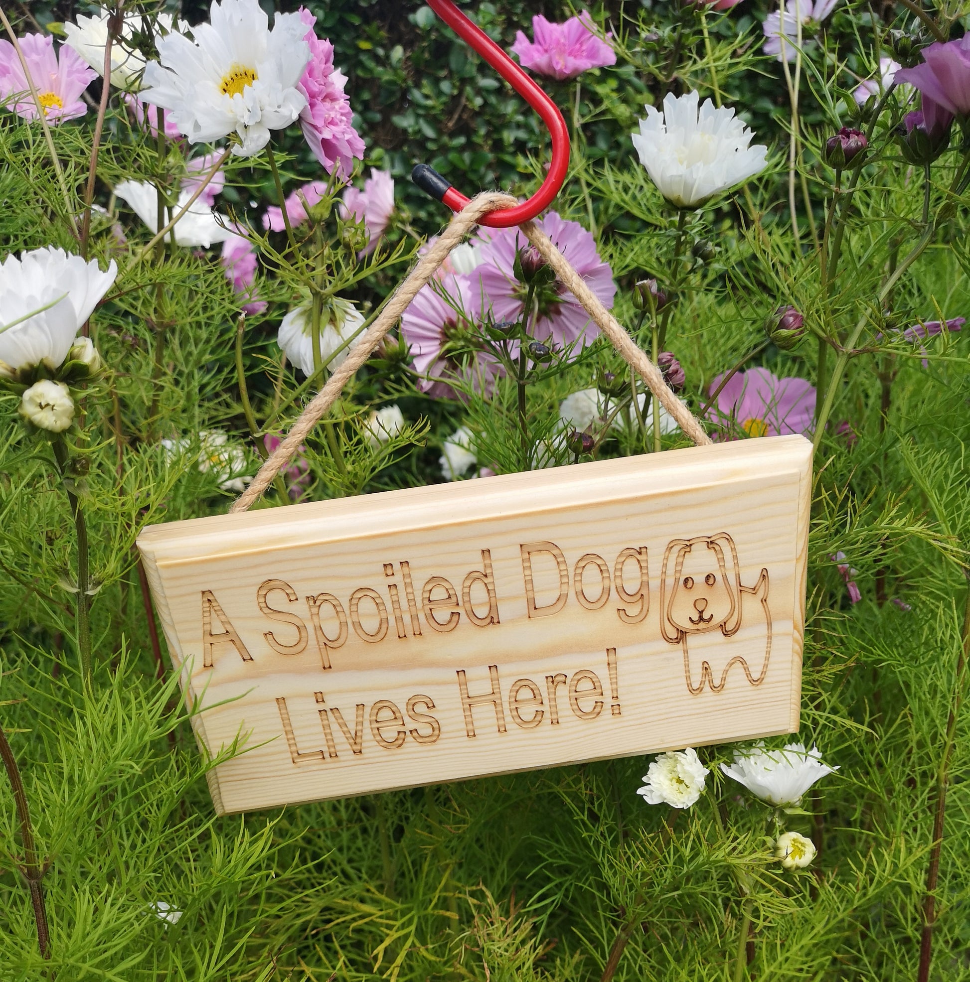 A spoiled dog lives here Outdoor Garden Sign - hanger