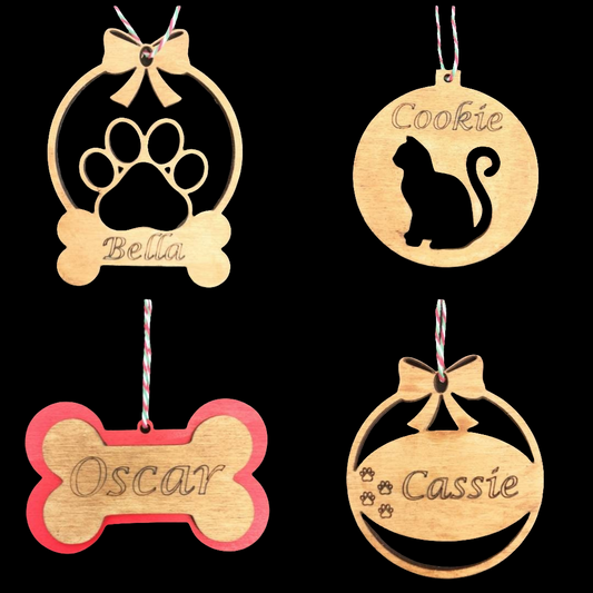 A selection of Pet Personalised Christmas Baubles. Made from high quality sustainably sourced ply-wood.