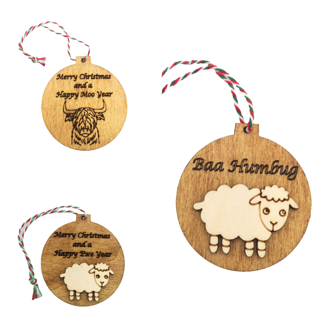 A selection of funny Farm Animal (Sheep and Cow) Christmas baubles. Made from high quality sustainably sourced ply-wood.