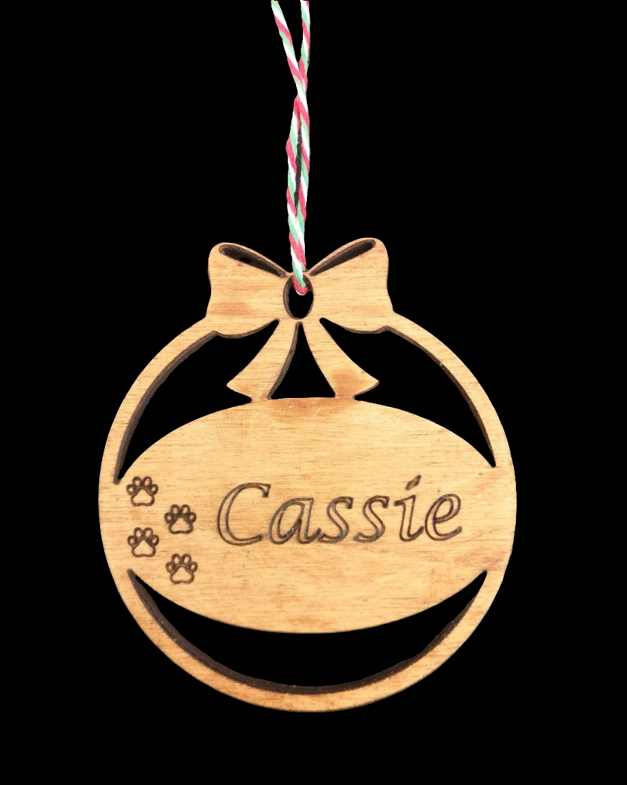 A selection of Pet Personalised Christmas Baubles. Made from high quality sustainably sourced ply-wood.