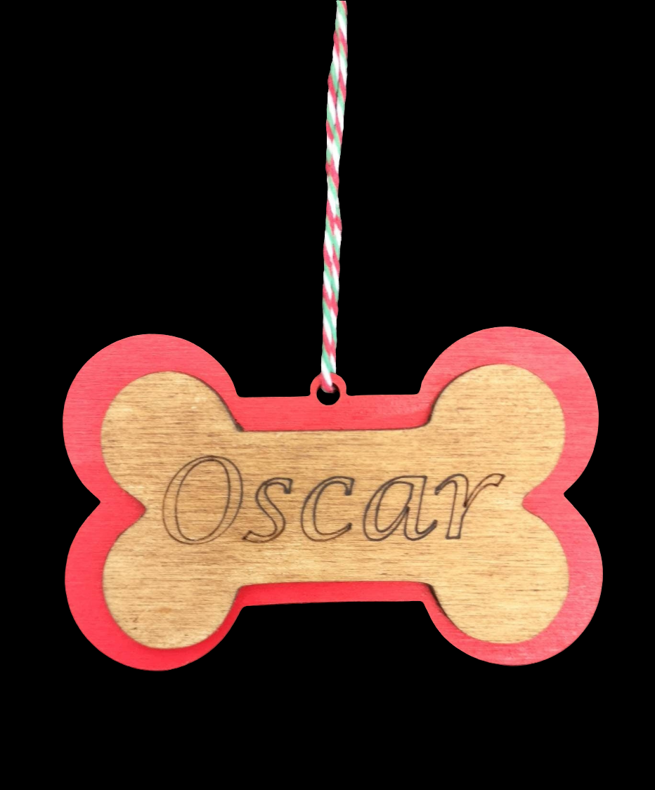 A selection of Pet Personalised Christmas Baubles. Made from high quality sustainably sourced ply-wood.