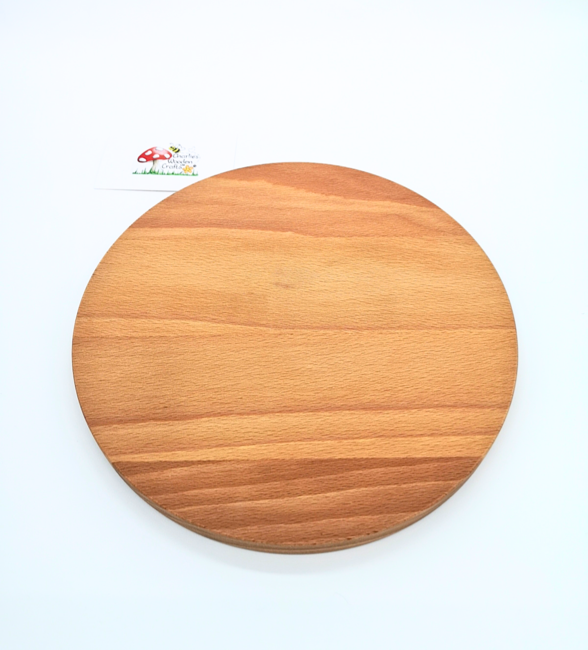 A Cheese Board made from Beech hardwood with a laser engraved design.