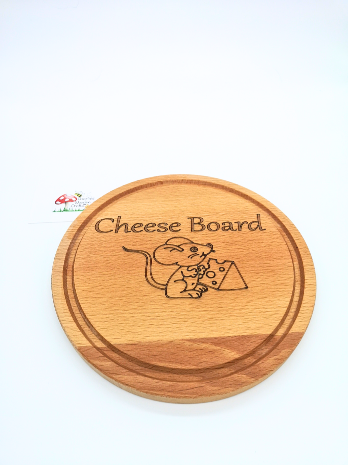 A Cheese Board made from Beech hardwood with a laser engraved design.