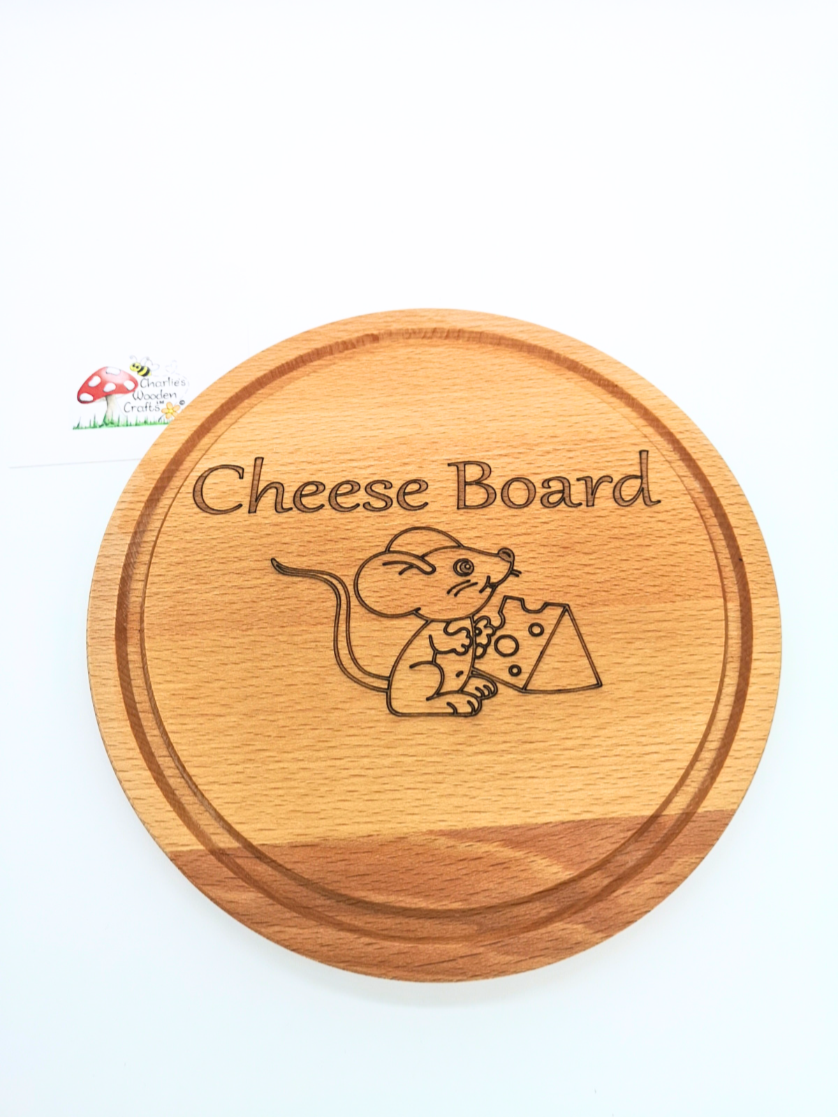 A Cheese Board made from Beech hardwood with a laser engraved design.